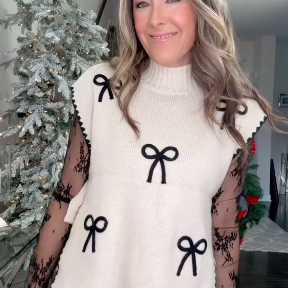 White Sweater Vest with Black Bow Accents